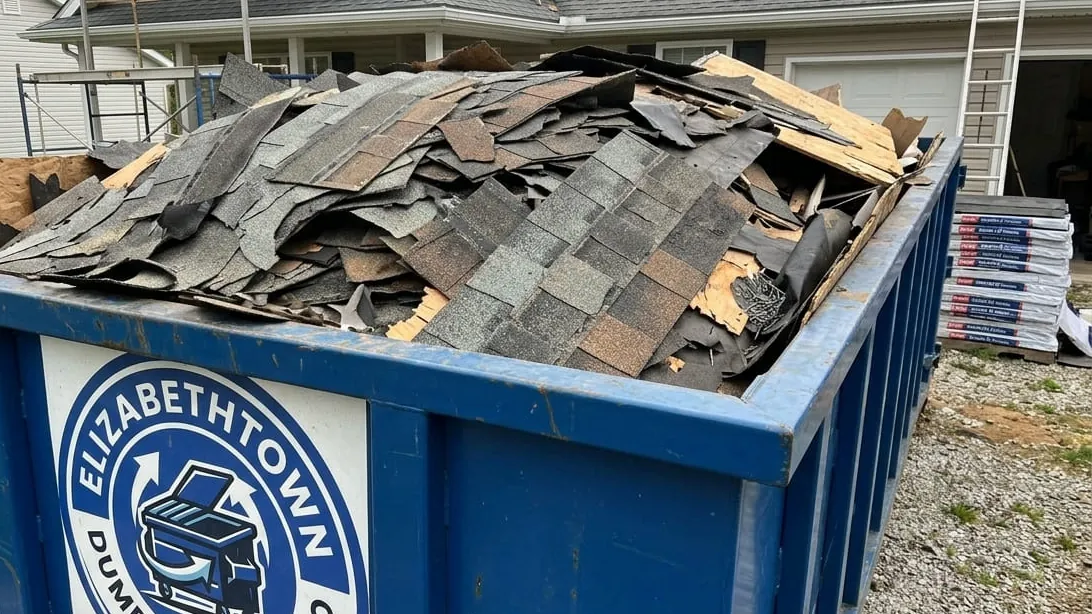 Roof tear-off dumpster sizing in Elizabethtown, Kentucky — shingle loaded flat by weight rather than by volume